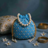 SHREE SHYAM PRODUCTS HAND EMBROIDERED SILK POTLI BAG